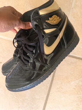 Air Jordan 1 Mid Patent Black Gold Sneakers